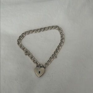 vintage silver bracelet with heart latch closure